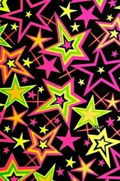 colorful stars on black background with pink, yellow and green colors