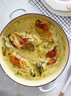 a large pan filled with food on top of a table