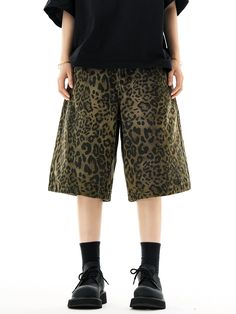 Unleash your wild side with these striking Leopard Print Wide-Leg Bermuda Shorts.
Crafted with a nod to vintage American leisurewear, these shorts boast a timeless leopard print on comfortable washed fabric. The wide-leg design ensures a versatile fit, making them an effortless addition to your relaxed yet stylish wardrobe.
Perfect for mixing and matching, pair these bermuda shorts with a sleek black top to let the print take center stage, or dress them down with a plain white tee for a casual d Wide Leg Cotton Bottoms In Leopard Print, Casual Leopard Print Cotton Bottoms, Leopard Print Wide Leg Bottoms With Relaxed Fit, Casual Tiger Print Summer Bottoms, Casual Tiger Print Bottoms For Summer, Casual Summer Bottoms With Tiger Print, Leopard Print Cotton Shorts For Summer, Summer Leopard Print Cotton Shorts, Trendy Leopard Print Short Bottoms