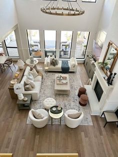 an aerial view of a living room with high ceilings