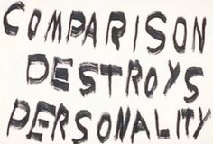 the words comparison destroy personality written in black on a white background with some type of writing