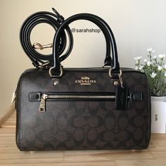 100% Authentic Coach F83607 Signature Rowan Brown/Black/Gold Hardware **New With Tags** Approximate Measurements: 10″ (L) X 6.5″ (H) X 5″ (W) Handles With 5.5" Drop Detachable Strap With 21" Drop For Shoulder Or Crossbody Wear Fall Brown Shoulder Bag With Branded Hardware, Chic Coach Satchel With Zipper Closure, Coach Black Satchel For Fall, Black Coach Satchel For Fall, Fall Shoulder Bag With Branded Hardware In Black, Black Shoulder Bag With Branded Hardware For Fall, Coach Black Shoulder Bag For Fall, Black Bags With Branded Hardware For Fall, Fall Black Bags With Branded Hardware