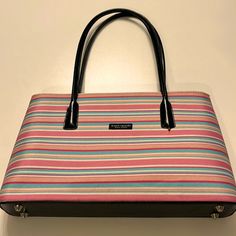 This Kate Spade Satchel Styled Bag Is Beautiful. Striped Pattern Of Vivid Pinks,Blues N White. Black Leather Black Zipper N Some Trimming. Interior Has 2 Large Open Sides. 1 Large Center Pocket W/Zipper Closure. Interior Has 1 Pockets On The Side For Phone Or Keys.. 10 1/2in Handles. Please See All Pictures Above..I Purchased From @Markettaschreck. Loved It, But Ready To Rotate For Something New. Thank You For Visiting My Closet Stop N Shop Anytime Reasonable Offers Only Please. Questions? Pleas Elegant Multicolor Satchel For Errands, Kate Spade Pink Tote Shoulder Bag, Kate Spade Multicolor Tote Bag, Kate Spade Pink Shoulder Bag For Travel, Pink Kate Spade Shoulder Bag For Travel, Elegant Multicolor Kate Spade Bag, Chic Multicolor Kate Spade Shoulder Bag, Kate Spade Multicolor Travel Bag, Kate Spade Multicolor Shoulder Bag For Travel