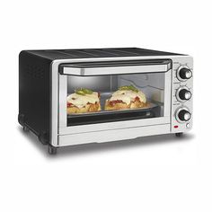 an open toaster oven with food cooking in it