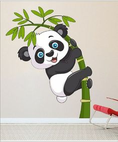 a panda bear hanging from a bamboo tree wall decal in a child's room