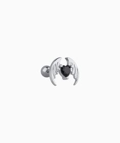 Bedeck your lobes with devilish delight with our cool Devil Heart Stud earrings. Featuring a chic black gemstone, these spooky studs are perfect for Halloween (or any other time you're feeling wickedly stylish). Detail： -Post material: stainless steel. Cubic Zirconia -Gauge: 20g | 0.8mm-Post length: 6mm -Dimensions: 7mm Length x 8.1mm Width -Include: single item -Closure: screw ball back * Shop extra ball backing here. * Piercings are sold individually for layering purposes. Sold individually. M Ear Inspiration, Ear Style, Heart Stud Earrings, Heart Studs, Heart Earrings Studs, Layered Look, Ear Piercings, Cubic Zirconia, Stud Earrings