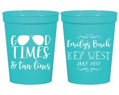 two plastic cups with the words good times and sunglasses on them, one is blue