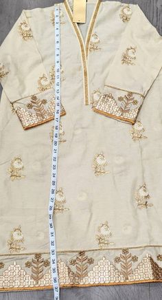 Floral Embroidered Kurta For Eid With Traditional Drape, Floral Embroidered Kurta With Traditional Drape For Eid, Traditional Drape Kurta With Floral Embroidery For Eid, Floral Embroidery Kurta With Traditional Drape For Eid, Floral Embroidered Kurta For Eid, Traditional Tunic With Traditional Drape For Festive Season, Festive Sets With Resham Embroidery In Tunic Shape, Designer Tunic Sets With Dabka Work, Traditional Festive Tunic With Traditional Drape