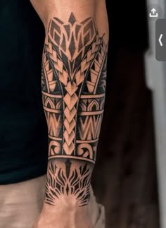 a man with a tattoo on his arm