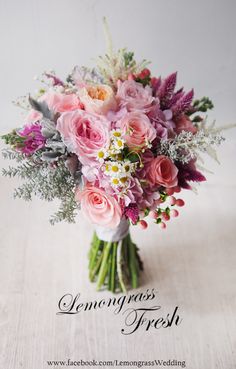 a bouquet of pink roses and greenery on a white background with the words lemongrass fresh