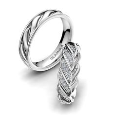 two white gold rings with diamonds on them