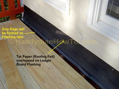 an image of the side of a house with wood flooring and trim around it