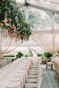 the tables are set up for an outdoor wedding