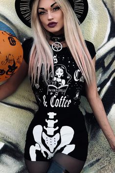 Spells Cats & Coffee Ladies SS tee Ladies fit stretchy & soft tee with our witch graphics. Its always a good time for Spells, Cats & Coffee! 95% Cotton, 5% Spandex Model 34" bust Wearing S Brand: Demi Loon Sizing: Very stretchy cotton spandex fabric sku: SCC9-SS-BLK Demi Loon alternative gothic clothing, demi loon dark pinup clothing, cute goth tees, witchy spells tees, cat mom tee, coffe t-shirt, cat mom t-shirt Fitted Trendy T-shirt With Skull Print, Fitted Black T-shirt With Funny Print, Fitted Black Top With Cartoon Print, Fitted Black Cartoon Print Tops, Trendy Fitted T-shirt With Cat Print, Fitted Crew Neck T-shirt With Cartoon Print, Fitted Grunge Skull Print T-shirt, Fitted Grunge T-shirt With Skull Print, Fitted Graphic Tee With Skull Print