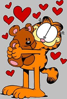 garfield the cat hugging a teddy bear with hearts