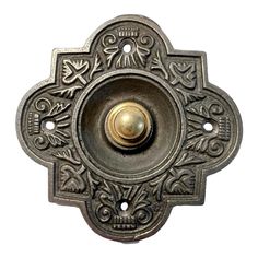 an ornate metal door handle on a white background