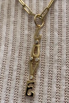 14k GOLD .08 CT GENUINE DIAMONDS 1.5" IN LENGTH