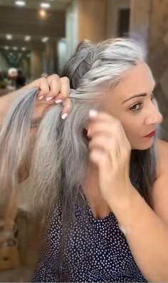 This guide shares a fabulous hairstyle for gray hair. Learn a rope braid bun hairdo in this quick post. Tutorial Chignon, Bun Hairdo, Messy Braided Hairstyles, Rope Braided Hairstyle, Selfie Filters, Grey Hair Over 50, Braid Bun, Embracing Diversity, Twisted Hair