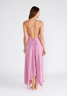 Freshen up your warm-weather wardrobe with our versatile halter neck beach dress in a breathable cotton gauze fabrication. This show-stopping style features a plunging v-neckline and a handkerchief hemline. The long straps can be tied in multiple ways, making it the most versatile dress in your closet. Airy cotton gauze Sleeveless Maxi length Handkerchief hemline V-neckline Halter neck Open back Cross back detail Long straps can be tied in multiple ways Model is 5'9, wearing a size S/M.Style: I-70552W-RJZ Flowy V-neck Backless Dress For Beach, Summer Flowy V-neck Halter Dress, Flowy V-neck Halter Dress For Beach, Spring Beachwear Backless Dress With Tie Back, Maxi Length Halter Dress For Beach Season Brunch, Flowy V-neck Backless Summer Dress, Flowy V-neck Halter Dress With Tie Back, Flowy Backless Halter Beach Dress, Flowy Backless Halter Dress For Beach