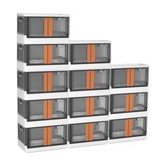 four stacks of cages with orange doors on them