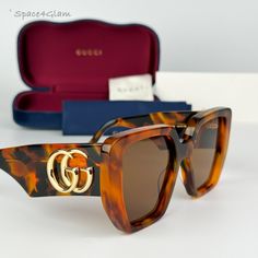 New Gucci Gg0956s 007 Havana Brown Cat Eye Unisex Sunglasses Gg 0956s Same/Next Day Free Shipping! No Offers Accepted. Final Price! Don't Miss Out, Shop Now! 100% Authentic & Brand New! Brand: Gucci Model Number: Gg0956s / Gg 0956s Color Code: 007 Gender: Women Frame Shape: Cat Eye Frame Color: Havana Frame Material: Acetate Frame Type: Full Rim Lens Color: Brown Lens Material: Nylon Size: 54x19x145 100% Uv Protection Made In Italy Full Retail Gucci Set Includes: Glasses Case Matching Satin Pouc Designer Cat Eye Sunglasses With Polarized Lenses For Summer, Designer Gucci Sunglasses For Summer, Designer Square Frame Sunglasses For The Beach, Designer Wayfarer Sunglasses For Summer, Designer Tinted Sunglasses For The Beach, Designer Square Frame Sunglasses For Beach, Designer Cat Eye Sunglasses For Summer, Designer Gucci Cat Eye Sunglasses With Uv Protection, Trendy Gucci Cat Eye Tinted Sunglasses