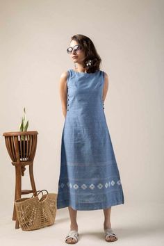 NE85 Edhas Handloom Cotton Dress is available online at best Price at Kessa. Buy NE85 from Dress - Women Clothing on kessa.com. This Lynch blue handloom cotton dress exudes timeless elegance, highlighted by intricate weaving work and side wooden buttons that add a rustic charm. The dress features a boat neck, sleeveless design, and convenient side pockets, complemented by stylish side cuts. Perfect for a sophisticated yet comfortable look, it combines traditional craftsmanship with modern ... Cotton Dress Pattern, Cotton Dresses Online, Kurtis Design, Linen Style Fashion, Stylish Kurtis, Wedding Outfits For Women, Casual Suits