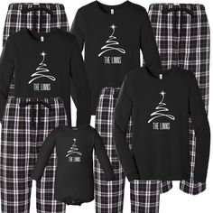 Outfit the whole family young and old. Nothing says Christmas matching family pajamas...say cheese! This festive Christmas Tree flannel set comes with a luxe 100% cotton jammie t-shirt in black with matching black plaid flannel pajama bottoms. Put the kids to bed in their Christmas pjs and let them rip open those packages Christmas morning. Your options are endless. This cozy pajama set is so comfortable it will be your go to uniform all winter break long. Set includes a black long sleeve t-shir Christmas Pajamas For Family Of 3, Christmas Matching Pajamas Families Short Sleeves Dear Santa, Matching Family Christmas Pajamas Photos, Xmas Pyjamas Family, Christmas Pants Matching, Matching Christmas Pajamas Couples Black African, Matching Christmas Pajamas Couples Casual, Couples Christmas Pajamas Old Navy, Matching White Christmas Pajamas Couples Black