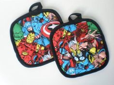 two oven mitts with avengers designs on them sitting next to each other in front of a white background