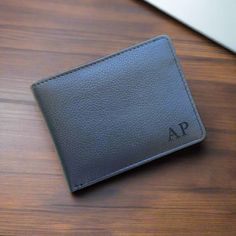 PERSONALISED WALLET WITH MESSAGE Introducing the Personalized Black Leather Men's Wallet - a stylish and durable accessory made from high-quality leather. It features multiple card slots, a spacious bill compartment, and a convenient ID window, making it perfect for any occasion. You have the option to add your initials or a special message to make it a unique and personalized accessory. Add it to your collection today and elevate your everyday style! HOW TO PERSONALISE:- 🔸Select A design from Personalized Bifold Wallet For Daily Use, Bifold Wallet With Rfid Blocking For Father's Day, Personalized Bifold Wallet, Rfid Blocking Bifold Wallet For Father's Day, Bifold Wallets For Father's Day, Father's Day Bifold Wallet With Card Slots, Personalized Black Wallet For Personal Use, Father's Day Bifold Wallet, Personalized Black Wallet