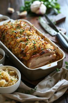 Roast pork topped with caramelized onions in a baking dish, garnished with fresh herbs. Pork Tenderloin With Sauerkraut, Pork Sauerkraut, Pork And Sauerkraut Recipe, Pork Roast And Sauerkraut, Oven Roasted Pork Tenderloin, Pork And Sauerkraut, Oven Roasted Pork, Sauerkraut Recipe, Pork Roast In Oven