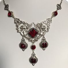 Red Necklace With Intricate Design For Party, Red Intricate Design Necklace For Party, Party Red Necklace With Intricate Design, Silver Baroque Jewelry For Party, Ornate Red Wedding Necklaces, Ornate Silver Baroque Necklaces, Ornate Red Filigree Necklaces, Ornate Red Filigree Necklace, Gothic Antique