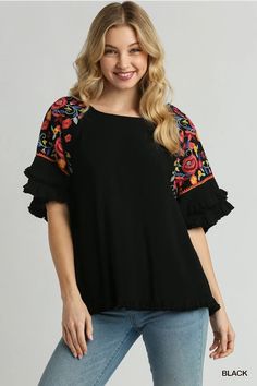 Step up your fashion game with our Floral Embroidered Round Neck Top! Crafted from a luxurious blend of 55% linen and 45% cotton, this top offers both comfort and style. The full front and back of this gorgeous top is a lovely solid go with anything black which provides a chic backdrop for the vibrant, multi-colored embroidery on the sleeves. The unfinished frayed hem adds a trendy, casual touch. Perfect for any occasion, this top is sure to become a staple in your wardrobe. Models are wearing s Rompers For Kids, Plus Size Romper, Umgee Tops, Round Neck Top, Round Neck Tops, Tee Dress, Embroidered Top, Hat Hairstyles, Fashion Tops