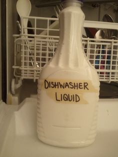 a dishwasher liquid bottle with the words dishwasher liquid written on it