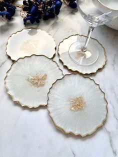 Your very own piece of functional art!  Choose colours to suit your individual colour scheme!   These beautiful pearly white and gold geode style resin coasters look great with any home interior colour scheme and make a truly unique addition to any coffee table, dinner set or bedside table.  These coasters are heat resistant up to 90 degrees Celsius so they'll be perfect for that all important tea or coffee!   The photos used are for illustration purposes only as each coaster will be completely unique, but all coasters will be similar to the designs shown.   If you have any questions before you order, please feel free to get in touch! CARE INFORMATION * Wash and polish with a clean soft cloth * Clean gently and do not submerge in water * Hand wash only * Keep out of direct sunlight to prot Resin Coasters, Interior House Colors, Resin Crafts Tutorial, Unique Coasters, Agate Coasters, Tea Coaster, Interior Color Schemes, Agate Geode, Coaster Design