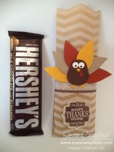 a candy bar with a turkey on it next to a bag of hersheys