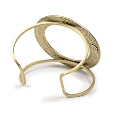 "This bracelet is a modern interpretation of a mid-century 1960s favorite. So true to the era and so relevant to current fashion, it has presence and clean simplicity. A bronze braided circle spans this open cuff, its graceful lines conforming to your wrist. Open cuff is sturdy and is adjustable to your wrist size. Fits sizes 6\" to 8\" wrists. Circle is 2-5/8\" diameter. Signed Sweet Romance Jewelry. Cast and fabricated by hand in our Los Angeles, USA studio." Adjustable Modern Bangle, Adjustable Brass Bangle For Formal Occasions, Adjustable Brass Bracelets For Formal Occasions, Everyday Adjustable Metal Cuff Bracelet, Modern Adjustable Cuff Bracelets, Adjustable Modern Cuff Bracelets, Adjustable Modern Metal Bracelets, Modern Adjustable Metal Bracelets, Modern Adjustable Metal Bracelet