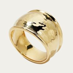 a gold ring that has been made to look like it is spinning in the wind