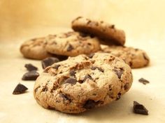 chocolate chip cookies are on the table ready to be eaten