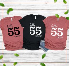 three t - shirts with the numbers 20, 20 and 30 printed on them in different colors