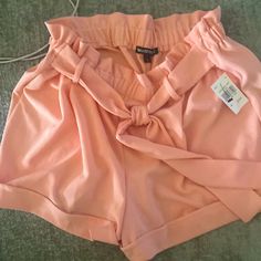 New Light Peach Stretch Shorts. There Is A Belt Built In That You Tie To Look Like A Bow. Casual Peach Bottoms For Summer, Pink Summer Shorts For Brunch, Chic Pink Shorts For Brunch, Peach Shorts For Summer, Peach Short Bottoms For Summer, Casual Peach Short Bottoms, Summer Peach Short Bottoms, Pink Short Bottoms For Brunch, Peach Shorts For Spring