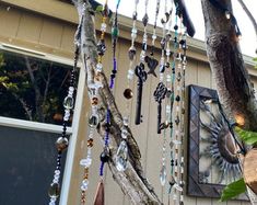 a tree with beads hanging from it's branches