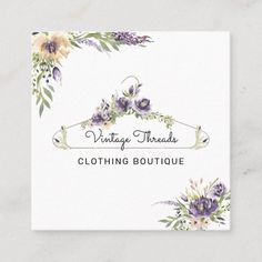 the vintage threads clothing boutique logo is shown on a white background with purple and yellow flowers