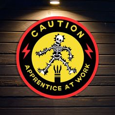 there is a sign that says caution and an image of a skeleton with lightning bolts on it