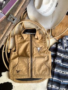 Cowboy Hardware Youth Live Free Tech Woodsman Vest - Buckskin | gussieduponline Kids Cowboy Chaps Pattern, Mens Western Leather Vest, Western Vest Boys, Fitted Western Leather Vest, Kids Western Wear, Cowboy Vest, Riding Vest, Kids Vest, Ranch Wear