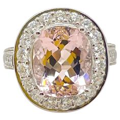 Morganite & Diamond Cocktail Ring Platinum 1 morganite= 5.07ct 108 round brilliant diamonds= 1.35ct Fine Jewelry Morganite Round Cut, Fine Jewelry Morganite Multi-stone, Fine Jewelry Multi-stone Morganite Pieces, Luxury Multi-stone Morganite Jewelry, Luxury Morganite Diamond-cut Jewelry, Pink Morganite Ring, Pink Emerald, Sparkly Jewelry, Morganite Diamond