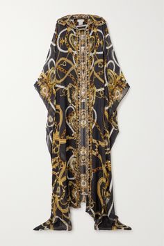 Part of the 'Amore Mio' collection, Camilla's exquisite robe is adorned with twinkling crystals and studs reminiscent of the sea. Cut from lightweight silk-chiffon, it's patterned with a nautical 'Coast To Coast' print of gilded chains and ropes and has dramatic sleeves that demand attention. Wear yours over a tonal bikini. Evening Silk Embellished Kaftan, Evening Embellished Silk Kaftan, Elegant Chiffon Kaftan, Elegant Embellished Gold Kaftan, Gold Embellished Evening Kaftan, Elegant Black Summer Kaftan, Luxury Silk Kaftan For Party, Elegant Embellished Kaftan For Vacation, Embellished Silk Kaftan For The Beach