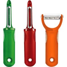 three different types of hair clippers in various colors and sizes, with one being used as a comb