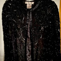 Stunning Adrianna Papell Black Beaded Jacket Size Petite Small Fits Likes Medium Includes Extra Beads Embellished Long Sleeve Outerwear For Night Out, Black Embellished Long Sleeve Outerwear, Black Embellished Evening Outerwear, Fitted Beaded Evening Outerwear, Elegant Beaded Long Sleeve Outerwear, Elegant Long Sleeve Beaded Outerwear, Vintage Black Embellished Outerwear, Fitted Long Sleeve Beaded Outerwear, Formal Beaded Winter Outerwear