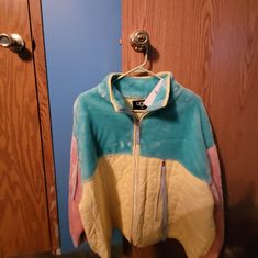 New With Tags. The Jacket Is Quilted And Sherpa. Very Pretty Jacket. Teal Pink And Yellow Retro Winter Outerwear With Contrast Colors, Multicolor Fleece-lined Outerwear For Cold Weather, Multicolor Outerwear With Fleece Lining For Cold Weather, Green Color Block Windbreaker For Winter, Retro Color Block Long Sleeve Outerwear, Retro Outerwear With Contrast Color For Spring, Retro Long Sleeve Color Block Outerwear, Outerwear With Contrast Color For Spring Outdoor, Contrast Color Outerwear For Outdoor Spring Activities