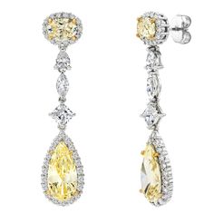 Elegant teardrops, with illustrious fancy light yellow cubic zirconia of the finest grade, are exquisitely regal. Modeled after the most exceptional fine jewelry, the center stone features gold prongs. These 18 karat gold plated prongs highlight the beauty of the center stone. Bling by Wilkening gold plating is four times thicker than the industry standard to ensure unparalleled quality and durability. Earrings are 2 inches long, and .25 inches wide. Please view additional model image for size s Formal Yellow Diamond Earrings With Diamond Cut, Formal Yellow Diamond Cut Earrings, Elegant Yellow Diamond Earrings, Yellow Diamond Earrings For Formal Occasions, Elegant Yellow Diamond Earrings For Formal Occasions, Formal Yellow Diamond Earrings, Pear-shaped Yellow Jewelry With Diamond Accents, Yellow Pear-shaped Jewelry With Diamond Accents, Elegant Yellow Diamond Earrings With Diamond Accents